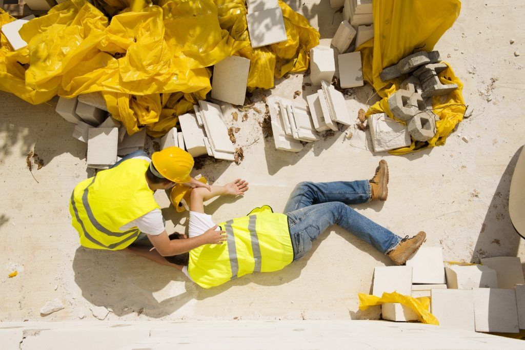 Picture of an injured worker laying on the ground prior to consulting with our Sonoma County workers comp lawyers.